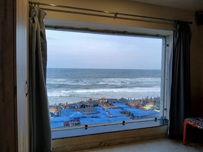 Deluxe AC Sea View Room at The Biswalaxmi Inn, Puri – unobstructed view of Bay of Bengal